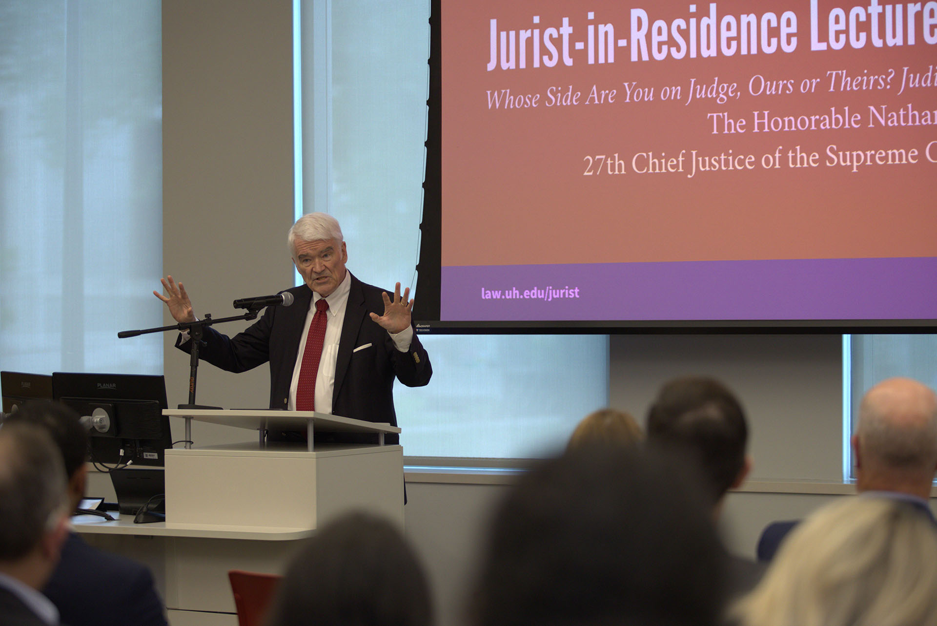 Former Texas Supreme Court Chief Justice Nathan L. Hecht speaks at a podium during the 2026 Justice Ruby Kless Sondock Lecture at the University of Houston Law Center